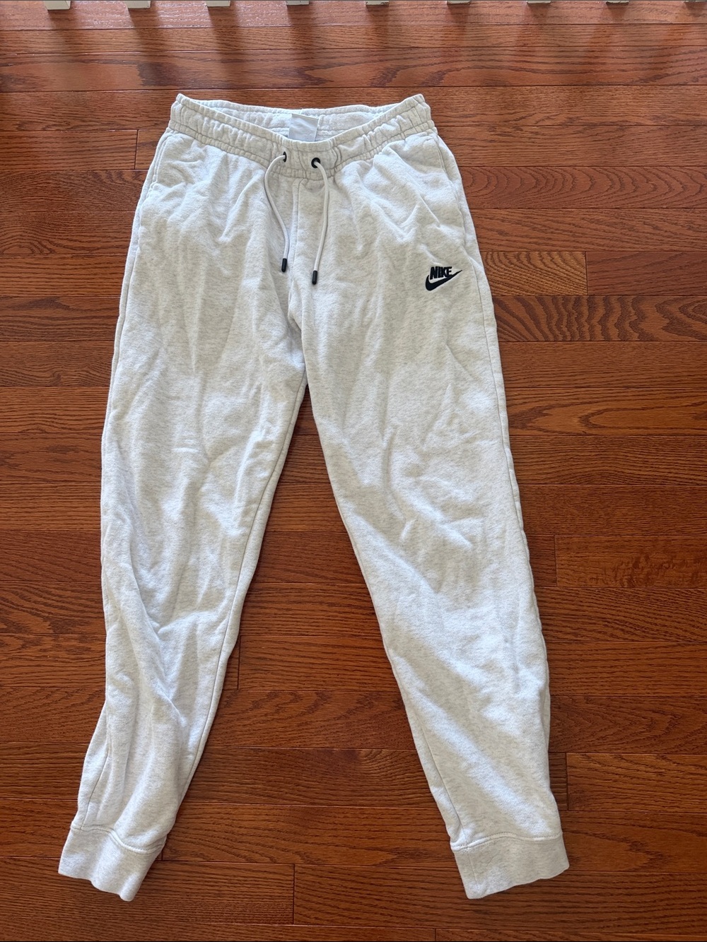 Nike Light Gray Kids Fleece Joggers with Black Swoosh
